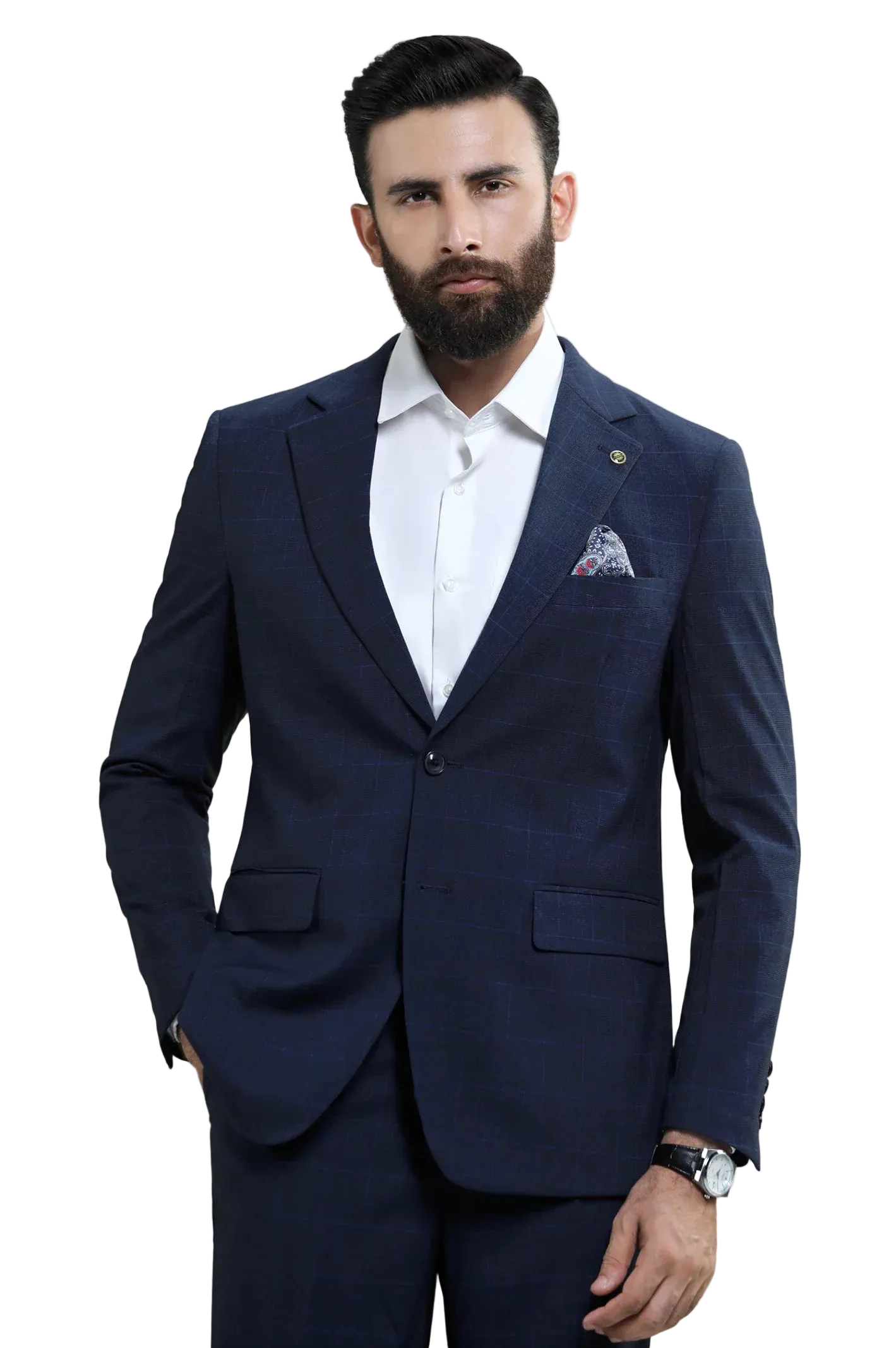 Man wearing a navy blue suit with a white shirt on a light gray background